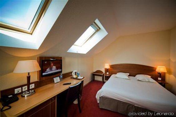Ibis Styles Clermont-Ferrand Aeroport Quarto foto